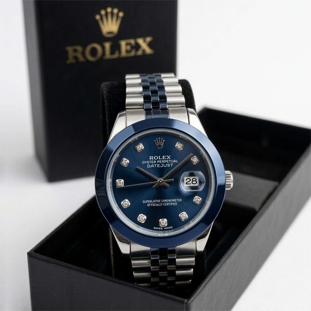 Rolex watch with blue face and silver bracelet in a black box