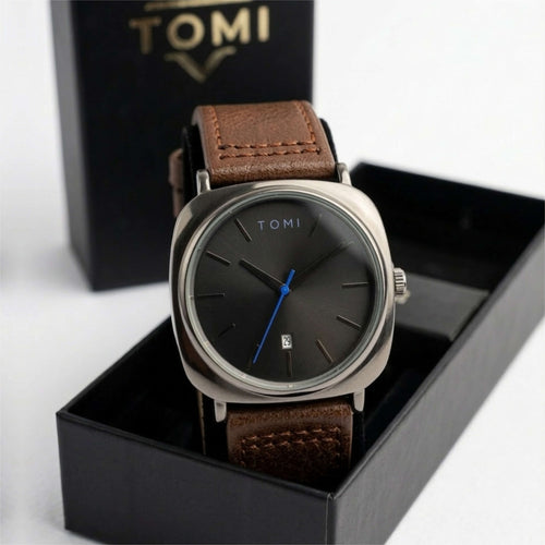 Tomi watch with brown leather strap in black box