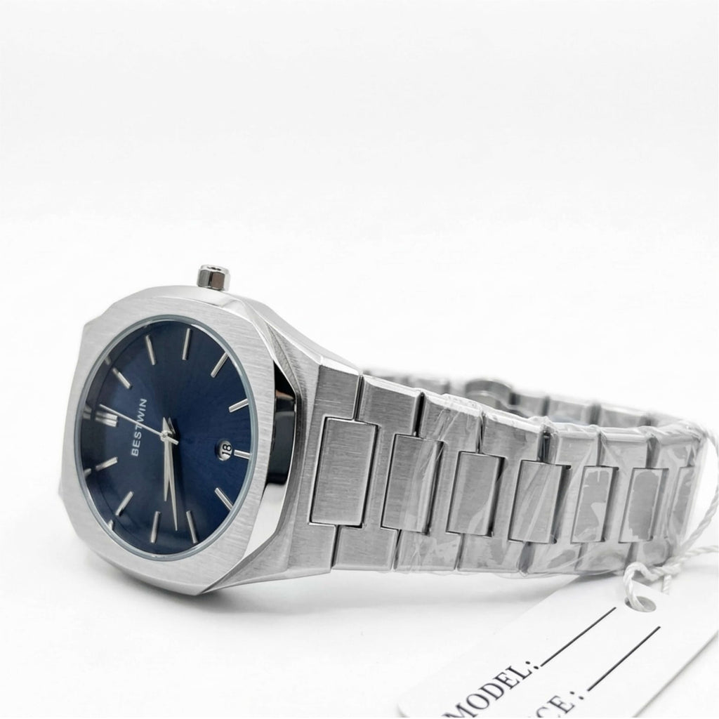 Silver watch with blue face on a white background