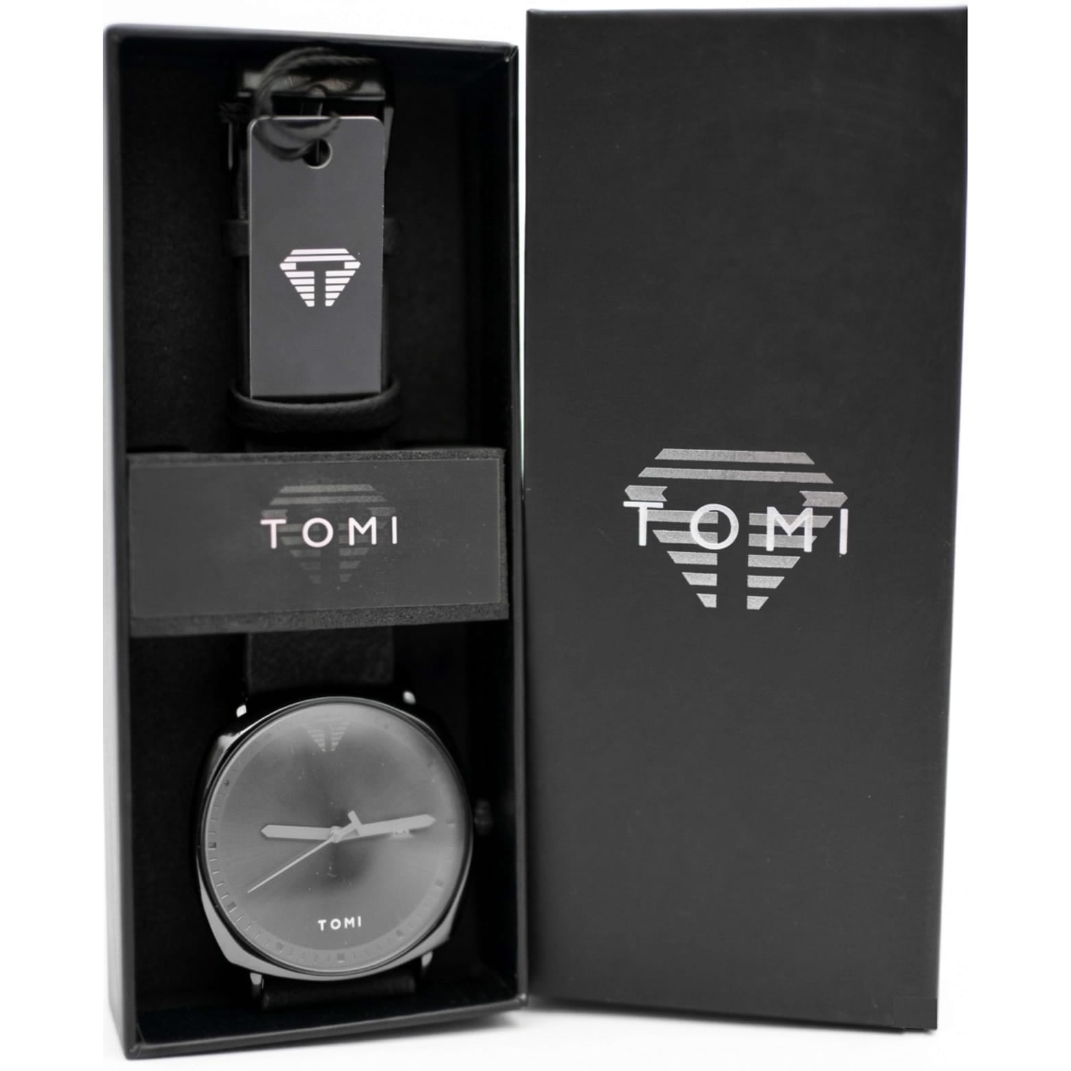 Black watch and keychain set with 'TOMI' branding in a black box.